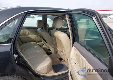 2000 Toyota Avalon Xl z USA, uszkodzony, nr VIN 4T1BF28B4YU113121